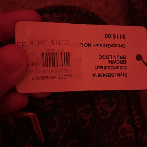 A guess bag, brand new. Still has tags and packaging inside - Picture 7 of 7